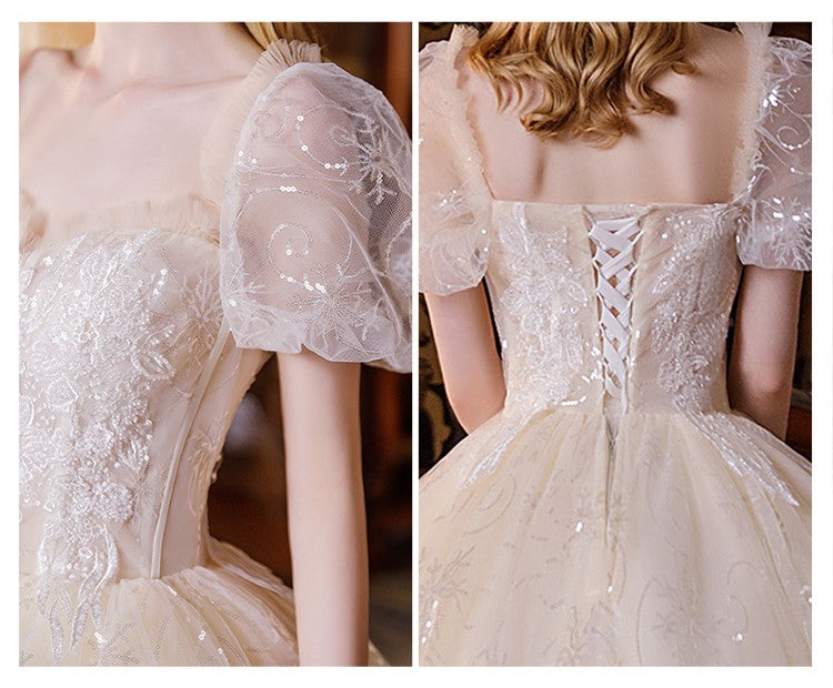 Ethereal shimmering puff sleeve evening gown with sequin embroidery