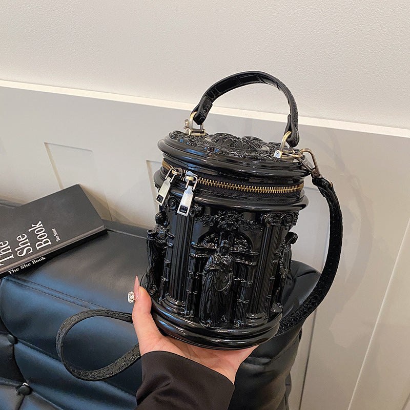 Baroque-style bucket bag with 3D relief detailing