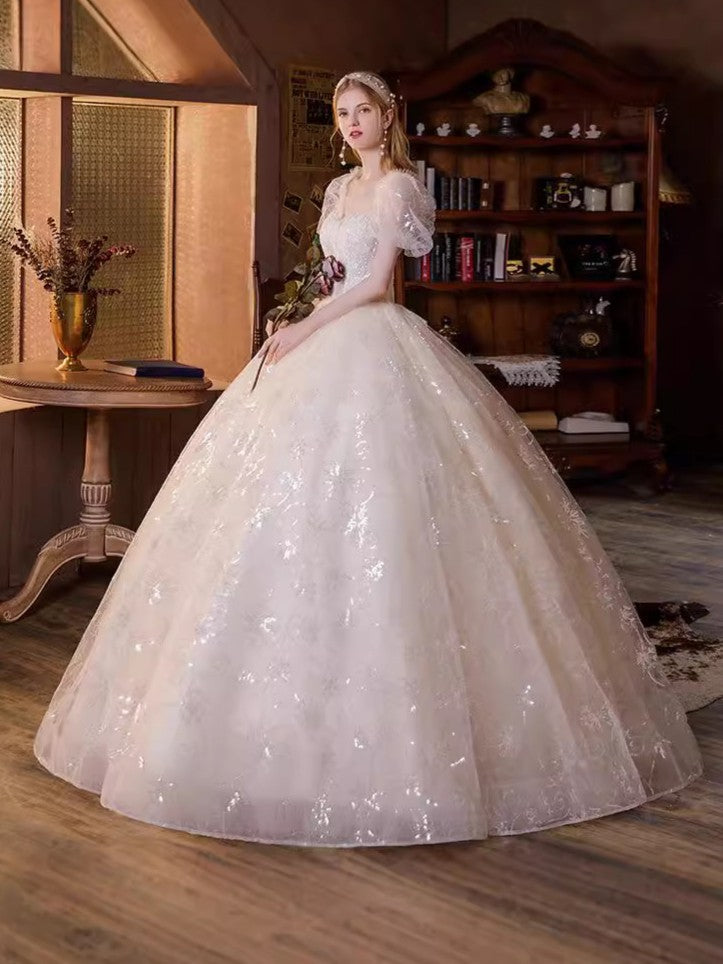 Ethereal shimmering puff sleeve evening gown with sequin embroidery