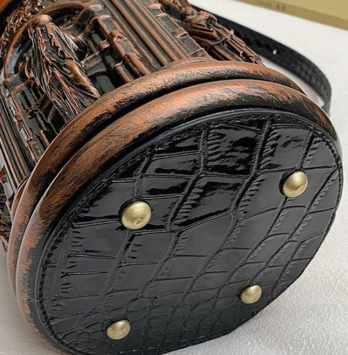 Baroque-style bucket bag with 3D relief detailing