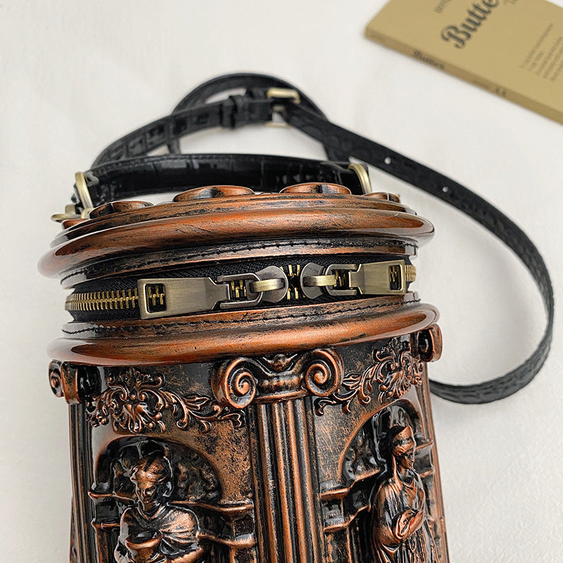 Baroque-style bucket bag with 3D relief detailing