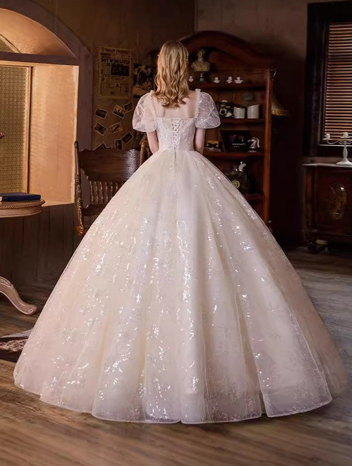 Ethereal shimmering puff sleeve evening gown with sequin embroidery